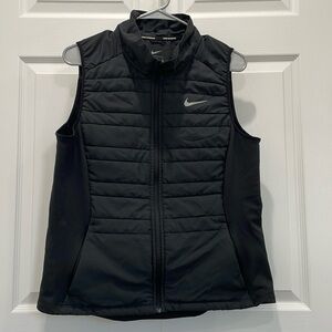 Nike Women’s Large Running vest.  Used but good condition
